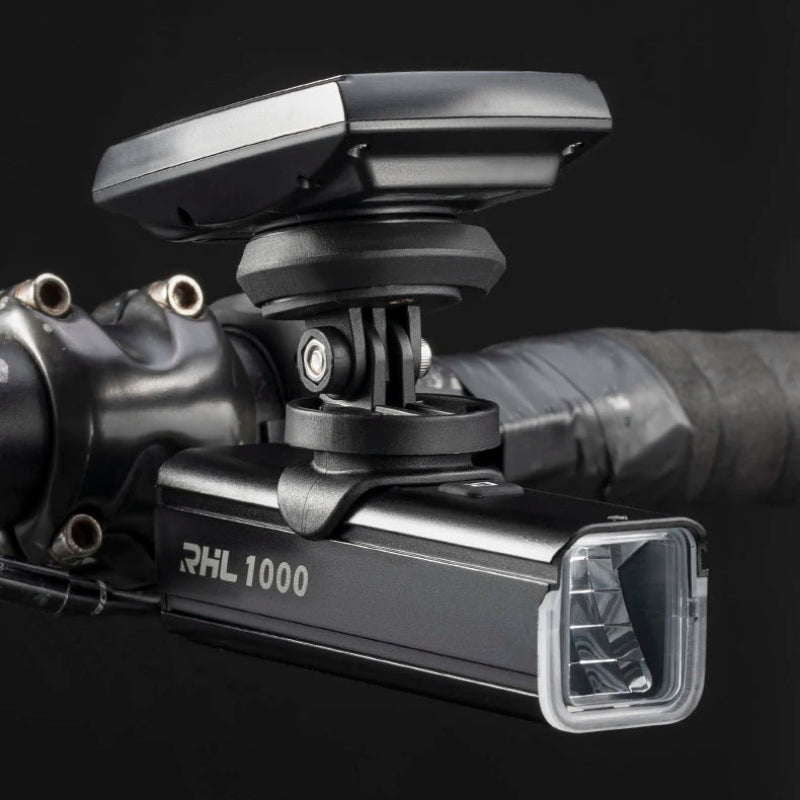 Bicycle light with mount on a black background