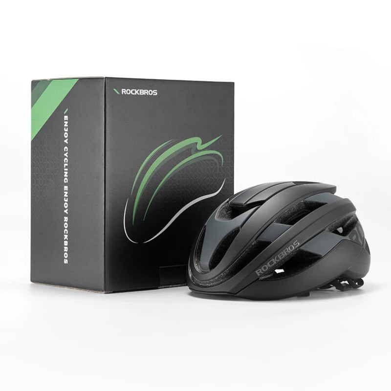 Black cycling helmet and packaging box on a white background