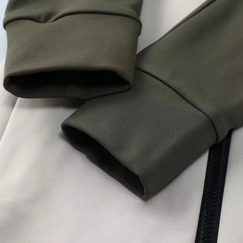 Close-up of green fabric with a light gray background