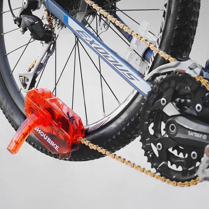 Bicycle chain with a red lock attached on a white background