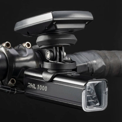 Bicycle light with mount on a black background