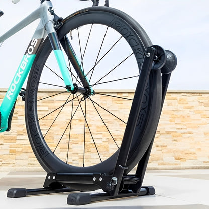 Bicycle wheel on a stand with a blurred background