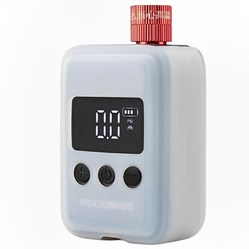 White bike pump with digital display and red top on a white background