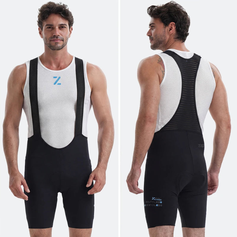 Man wearing a black and white cycling bib shorts with a visible brand logo on a white background