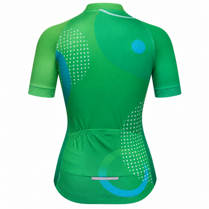 A women's short-sleeve cycling jersey shown from the back, featuring a vibrant green base with abstract geometric patterns in light blue and white.
