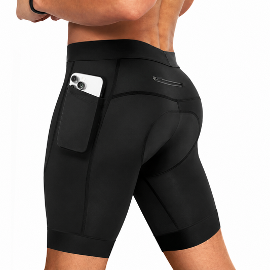 Black athletic compression shorts with a side pocket holding a white smartphone, shown on a model from a rear three-quarter view against a plain white background.