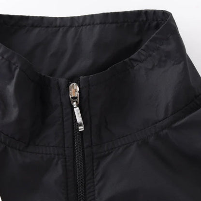 Black jacket with zipper detail on a white background