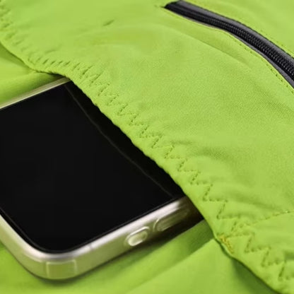 Smartphone in a green pocket with a zipper