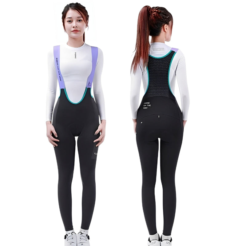 Woman wearing a black and white ski suit with suspenders, shown from front and back.