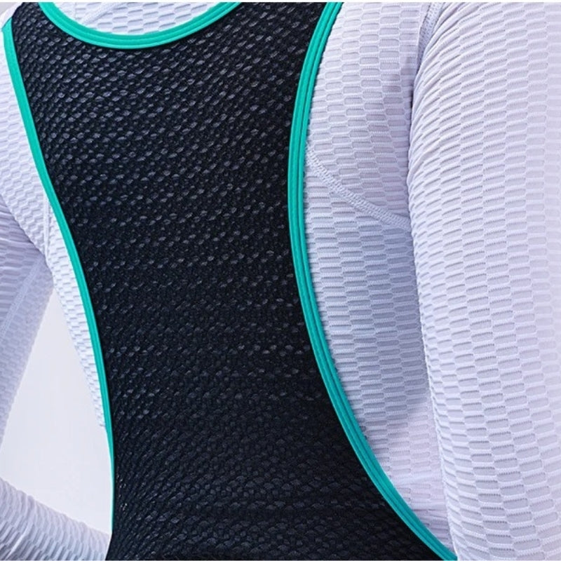 Close-up of a sports outfit with black mesh back and white sleeves.