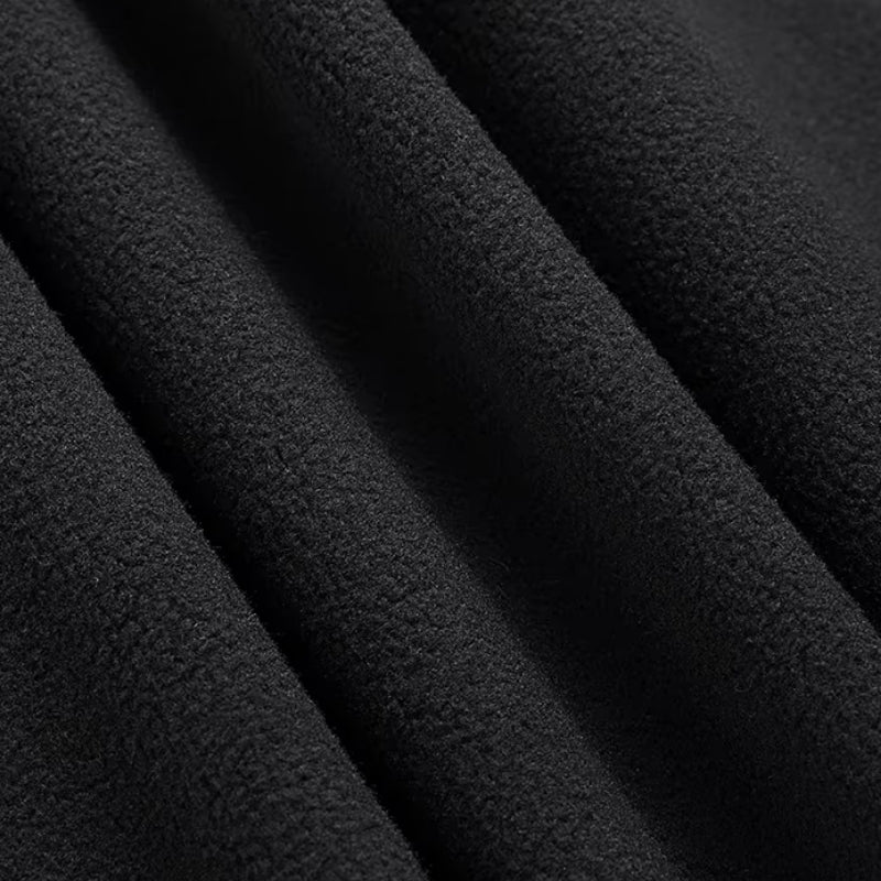 Close-up of black fabric with a textured pattern