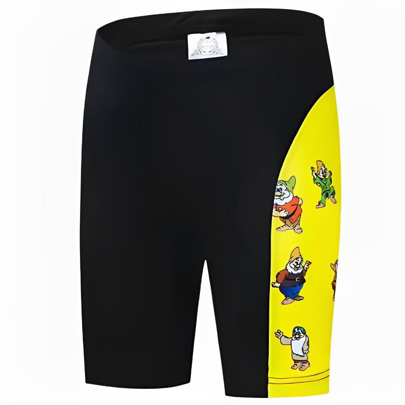 Black shorts with a yellow side panel featuring cartoon characters on a white background