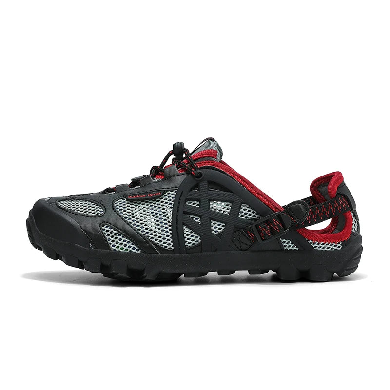 A single black and gray athletic water shoe with red accents, shown in a side profile on a white background.