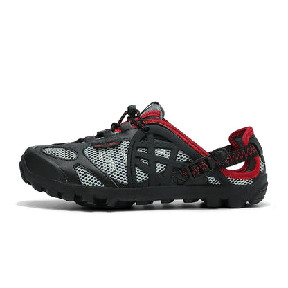 A single black and gray athletic water shoe with red accents, shown in a side profile on a white background.