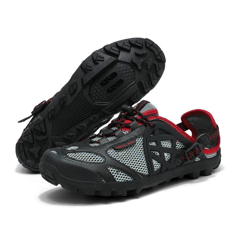 A pair of black and gray athletic water shoes with red accents, showing both the side profile and the treaded outsole on a white background.
