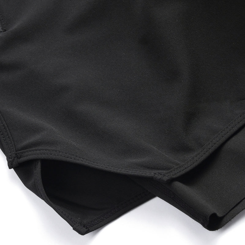 Close-up of black fabric with a white background