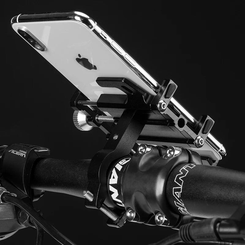Phone mount on a bicycle handlebar with a black background