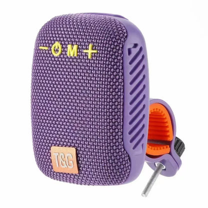 Purple portable speaker on a white background