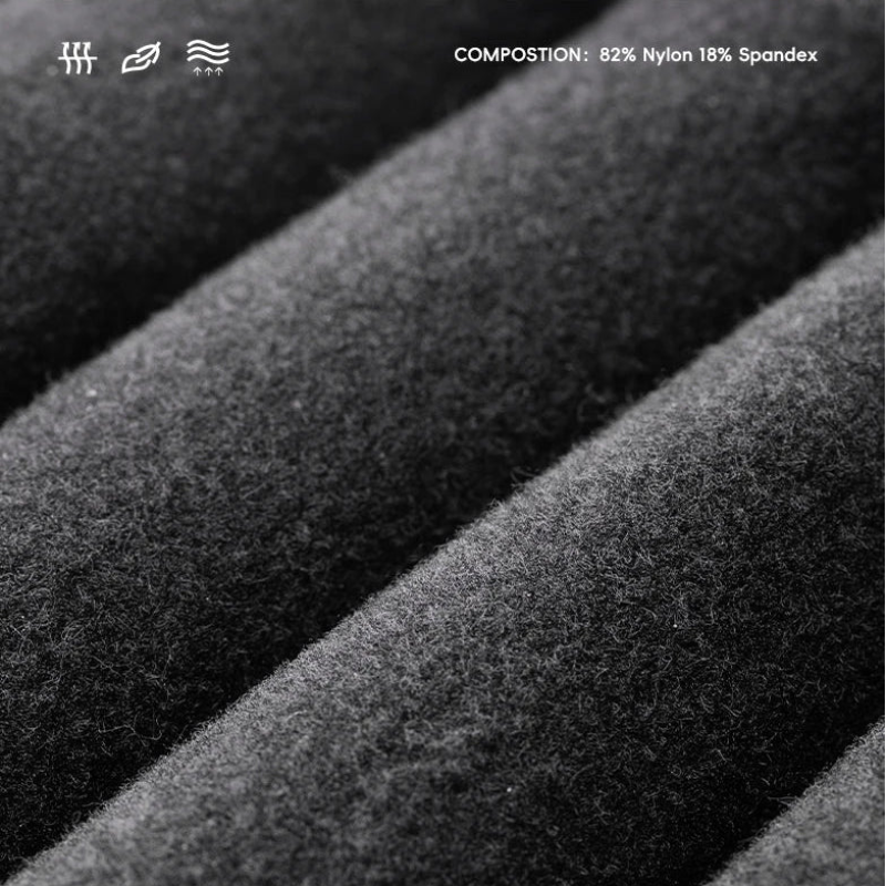 Close-up of textured fabric with a composition label underneath
