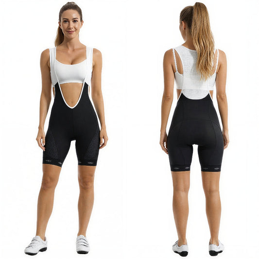 Woman modeling a black cycling outfit with cut-out design on a white background