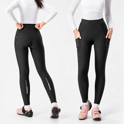 Two views of a model wearing black high-waisted cycling leggings with side pockets and reflective striping, paired with a white long-sleeve top and cycling shoes, against a plain white background.