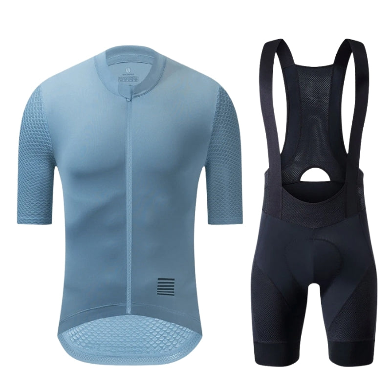 Blue cycling jersey and black bib shorts on a white background