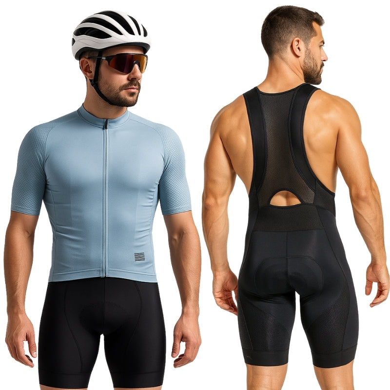 Cyclist wearing a light blue jersey and black shorts with a black bib shorts on a white background