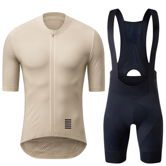 Beige cycling jersey and navy bib shorts on a white background