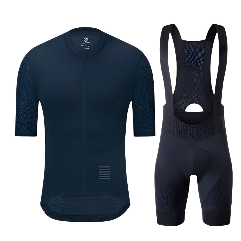 Black cycling jersey and bib shorts set on a white background