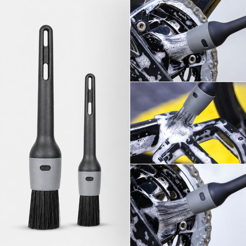 Two black and gray brushes with close-up images of a bike chain being cleaned.