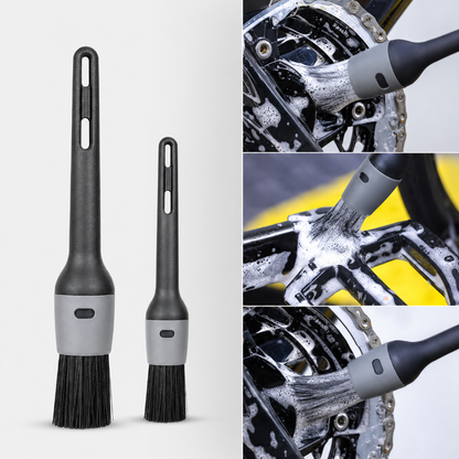 Two black and gray brushes with close-up images of a bike chain being cleaned.