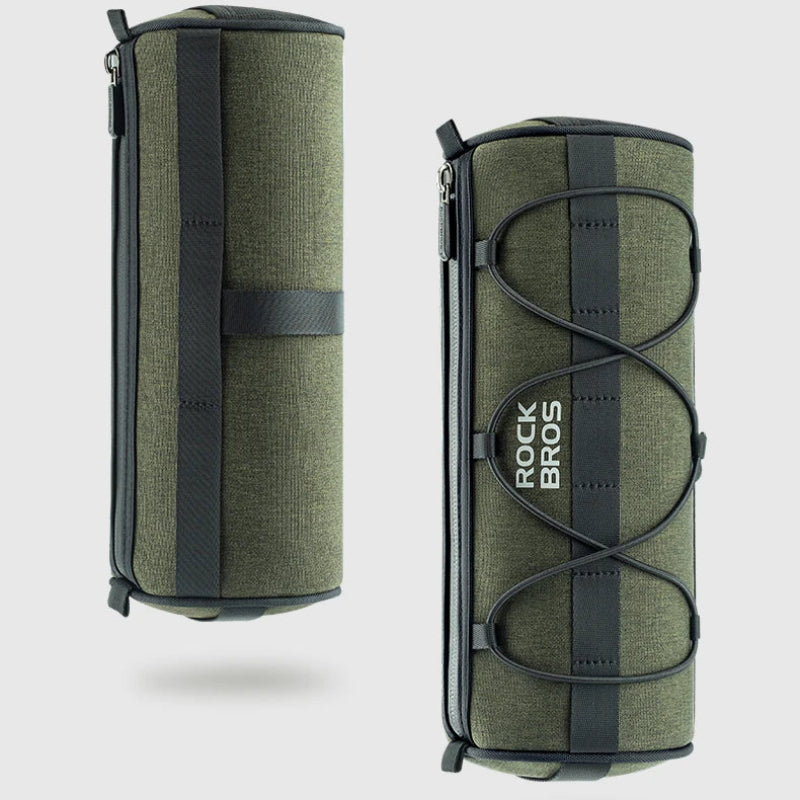 Green roll-up bag with black straps on a light gray background