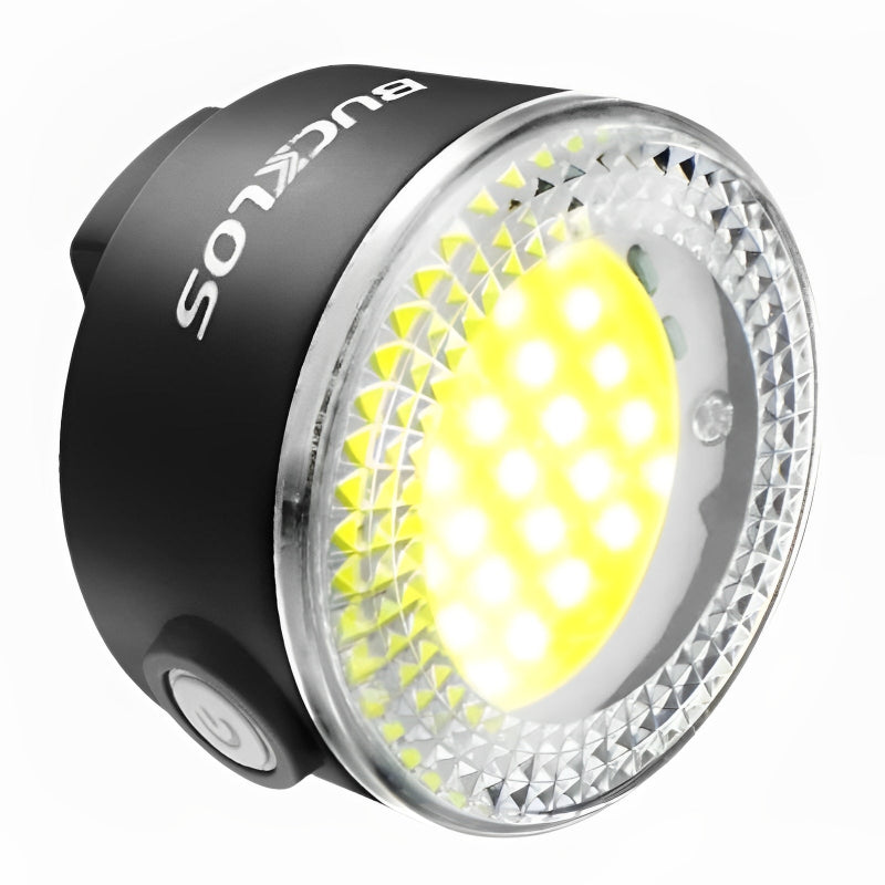 Front bike light with visible brand logo on a white background