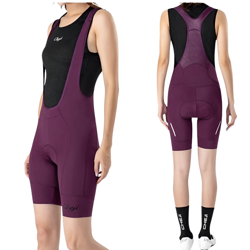 Purple cycling bib shorts with black top on a white background