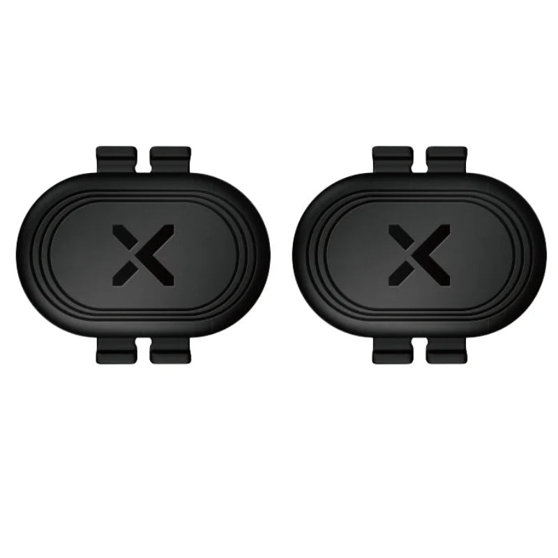 Two black Speed/Cadence Sensors on a white background with an orange label.