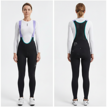 Woman wearing a black cycling bib suit with white long-sleeve top on a white background