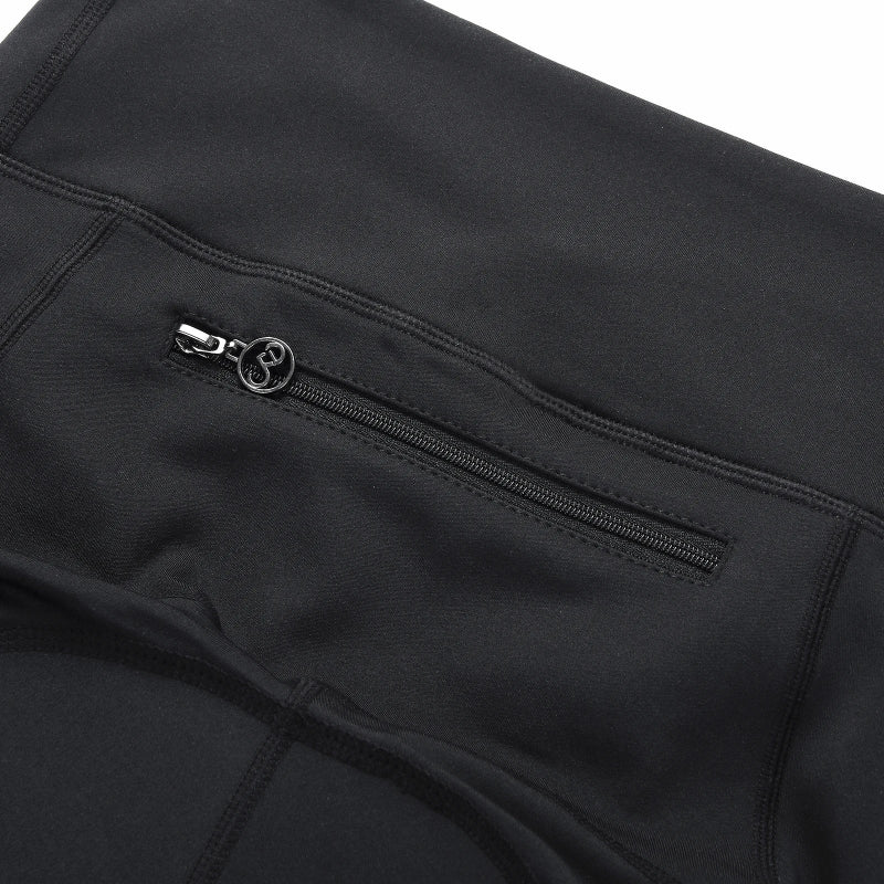 Close-up of a black jacket with a zipper pocket on a white background