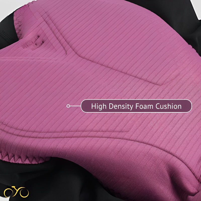 Close-up of a pink high-density foam cushion with text label on a dark background