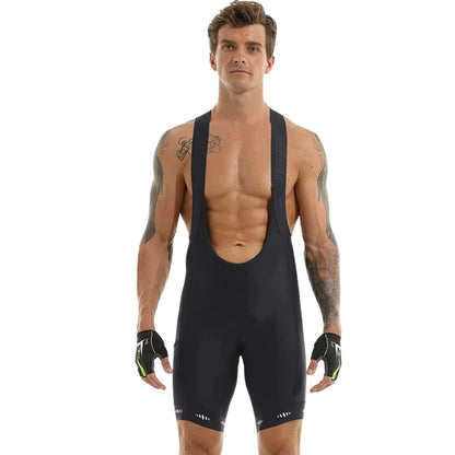 Man wearing a black cycling bib shorts on a white background