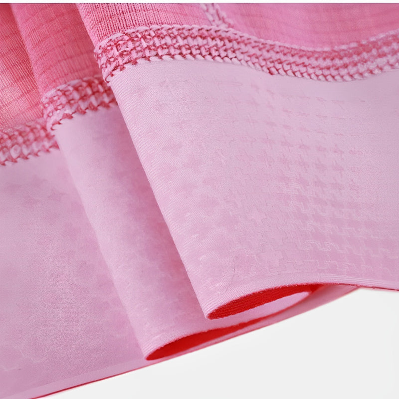 Technical fabric of pink women's cycling jersey for summer rides