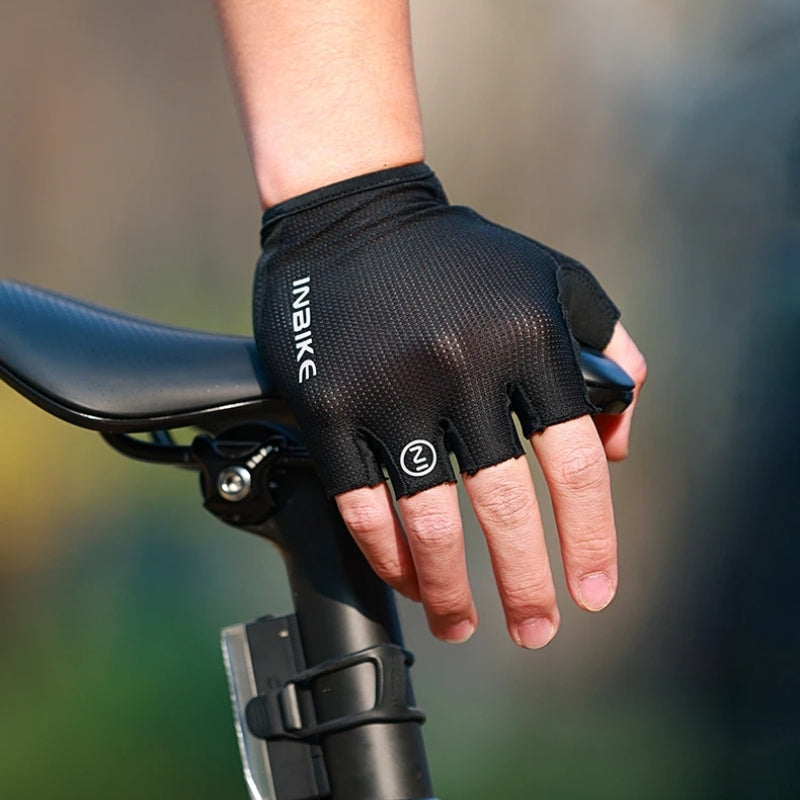 Black cycling glove on a blurred background
