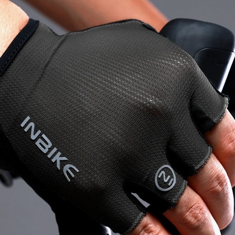 Black cycling glove on a blurred background