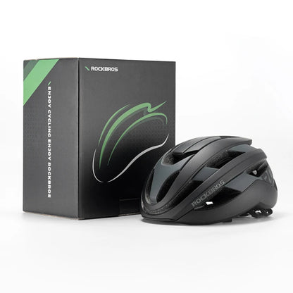 Black cycling helmet and packaging box on a white background