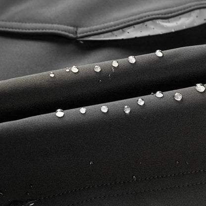 Close-up of water droplets on a black surface