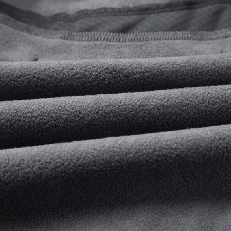Close-up of gray fleece fabric with visible texture
