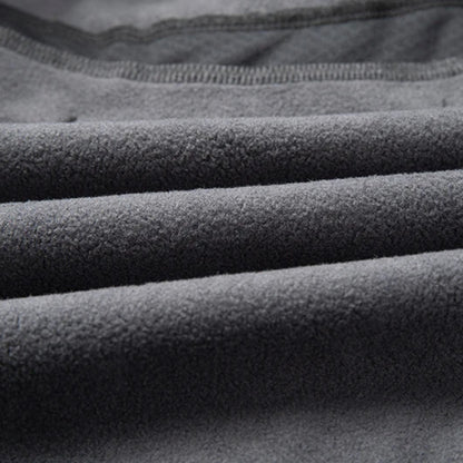 Close-up of gray fleece fabric with visible texture