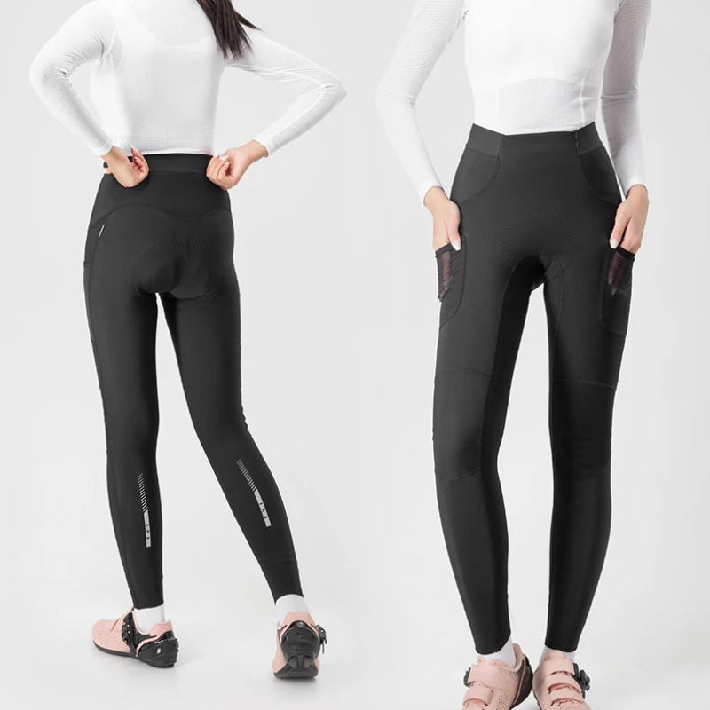 Two women wearing white long-sleeve tops and black leggings on a light gray background.