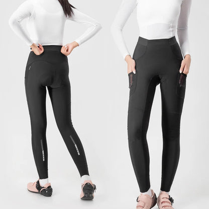 Two women wearing white long-sleeve tops and black leggings on a light gray background.