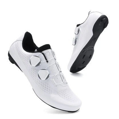 White cycling shoes with black soles on a white background