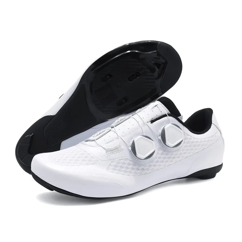 White cycling shoes with black soles on a white background